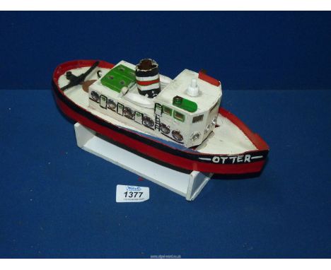 An apparently scratch made model Tug Boat ''Otter'' having battery driven propeller, complete with stand, length 11'', beam 3