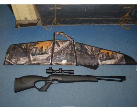 A Weihrauch 5.5 mm/.22 calibre HW 97 air rifle serial No. 2096075 with a "Nuprol" 4 x 32 EG back-lit cross-wire telescopic si