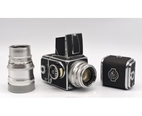 A 1958 Hasselblad 500C Medium Format Chrome SLR Camera outfit, Body No. CR35046, with a Carl Zeiss 80mm f/2.8 Planar Lens No.