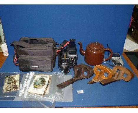 A box of miscellanea including three vintage stereo viewers (a/f.), wind-up radio, enamel teapot, folder of postcards and a P