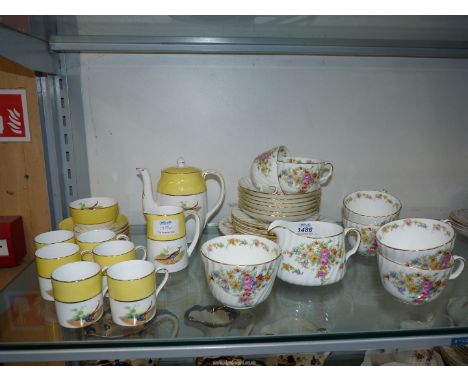 A part Minton 'Lorraine' tea set to include;  six cups and saucers and six plates, jug and a sugar bowl (no teapot) and a yel