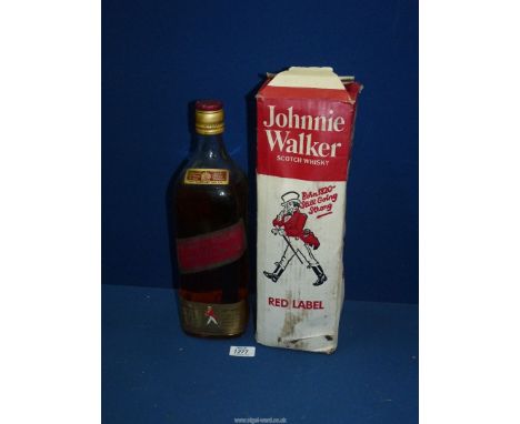 A boxed, (approx. 1970's) Johnnie Walker Red Label, four pint bottle of scotch whisky.