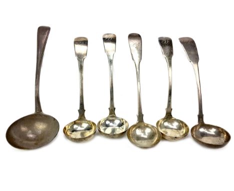 LOT OF FIVE SILVER TODDY LADLES, various makers and assays, Fiddle pattern, the largest 16.5cm long, along with a silver sauc