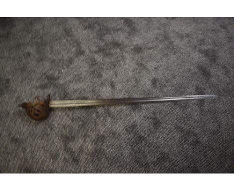 A possible 18th century Scotish Broadsword having steel basket handle with carved wood grip, blade length 94cm, overall lengt