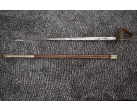 A Edward VII 1827 Pattern Rifle Officer’s Sword having strung bugle decoration, with metal and leather scabbard, blade length