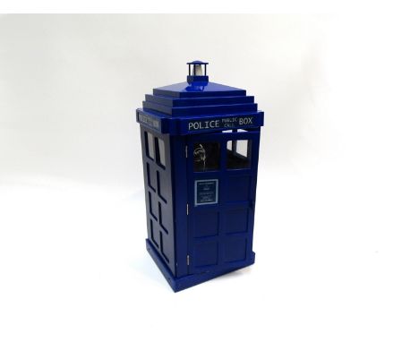 A Tardis Police Call Box novelty Doctor Who inspired telephone with flashing light by Steepletone. 46cm high