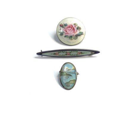 Antique silver and enamel brooches 