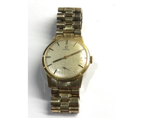 Vintage omega gents wristwatch and bracelet striped dial manual wind cal 269  17 jewel working order but no warranty is given