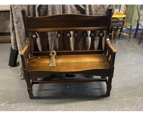 A small oak church pew - 2 seater 107cm wide, 109 high, 39cm deep.&nbsp; Seat height 45cm