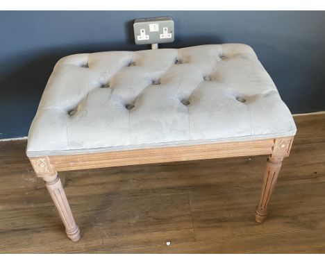 A contemporary footstool with duck egg blue velvet upholstery
66cm long x 47 high x 44 wide