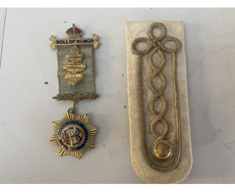 A Roll of Honour Medal R.A.O.B Royal Antediluvian Order of Buffaloes and a naval officer's dress uniform slide / epaulette