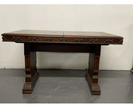 An interesting extendable oak side table reportedly used in an ecclesiastical setting in the preparation of communion.
100cm 