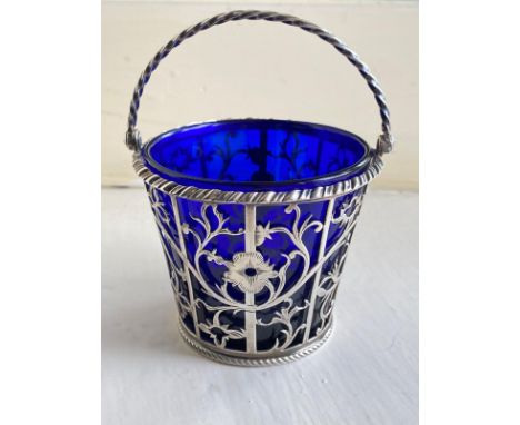 Georgian sugar basket with blue glass liner.&nbsp; London 1772.&nbsp; Maker:&nbsp; Fras Stamp.&nbsp; Silver weight:&nbsp; 70g