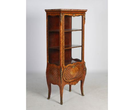 A late 19th/ early 20th century French kingwood, marquetry and gilt metal mounted vitrine, the mottled red and white rectangu