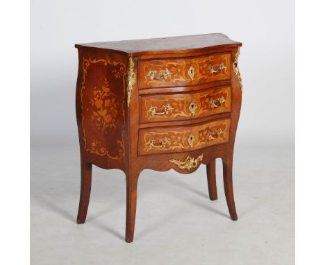 A late 19th/ early 20th century French Louis XV style kingwood, marquetry and gilt metal mounted serpentine commode, the shap