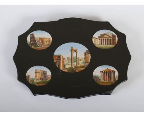 A 19th century Italian micromosaic plaque, depicting five oval shaped views of Rome set into a shaped black marble surround, 