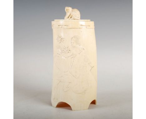 A Japanese ivory tusk vase and cover, Meiji Period, decorated in relief with Bijin and two other figures, the cover with tige