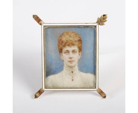 A 19th century portrait miniature of a Victorian Lady, within a yellow metal and white enamel rectangular strut frame, 4cm x 