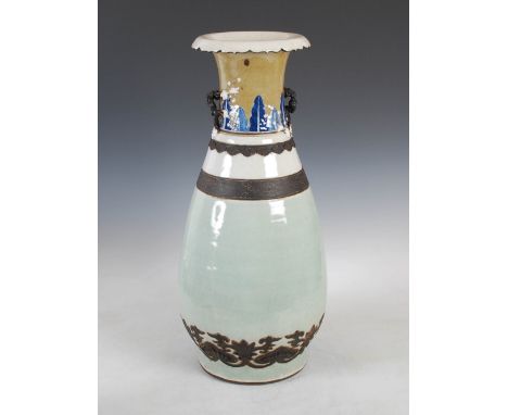 A Chinese porcelain celadon ground crackle glazed pear shaped vase, late Qing Dynasty, the neck with blossom branch handles, 