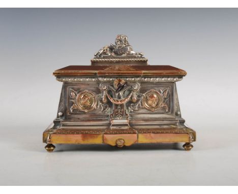 A late 19th century electroplated on copper Jewellery casket by L. Oudry, sarcophagus shaped with recumbent lion final, openi