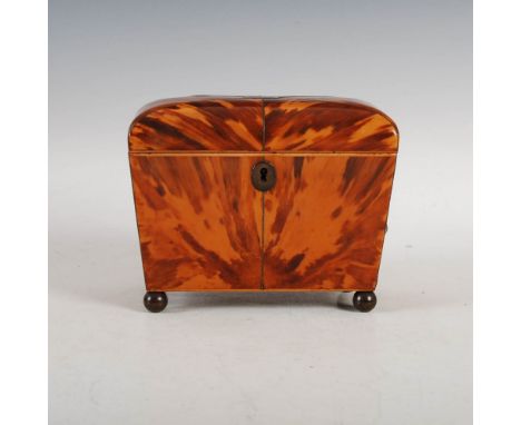 A 19th century tortoiseshell tea caddy, the rectangular cover centred with a white metal rectangular tablet bearing initials 