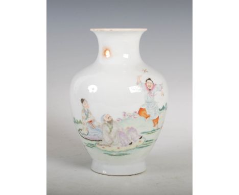 A Chinese porcelain famille rose vase, Qianlong seal mark but later, decorated with two immortals and actor in a fenced garde