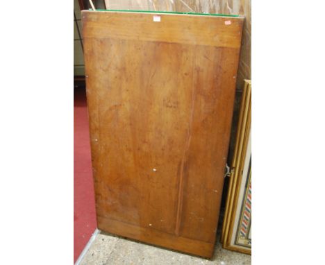 An early 20th century walnut folding bagatelle board, with cue and quantity of balls 