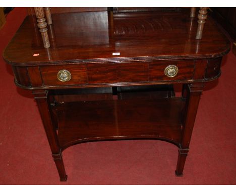 A 19th century mahogany and ebony strung round cornered single drawer side table