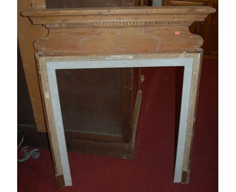 A late Victorian pine and gesso moulded fire surround