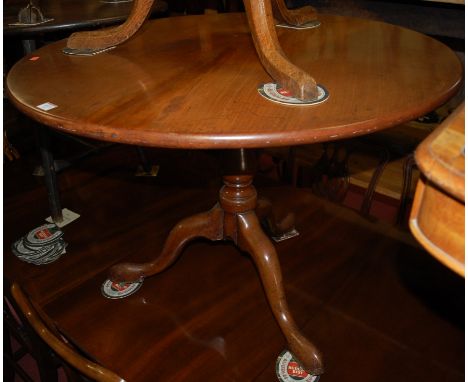 A George III mahogany circular topped tilt top tripod table of good size