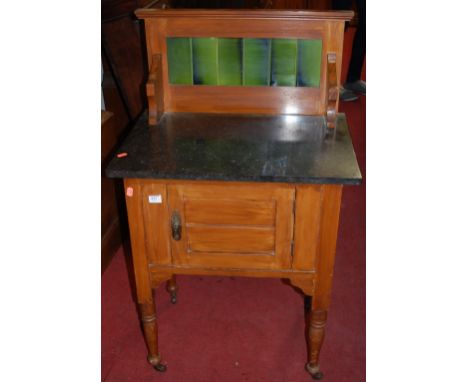 An Edwardian satin walnut, marble topped and tile inset washstand of small proportions 