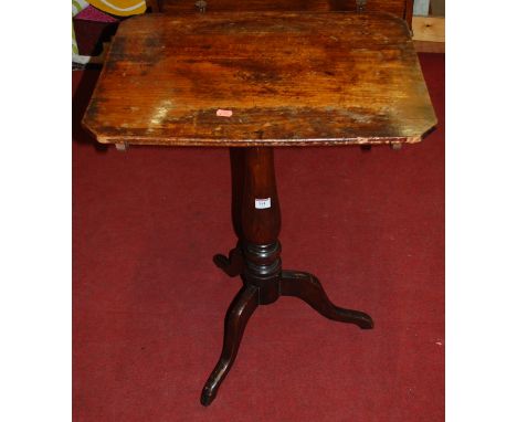 A 19th century mahogany tilt top pedestal tripod table