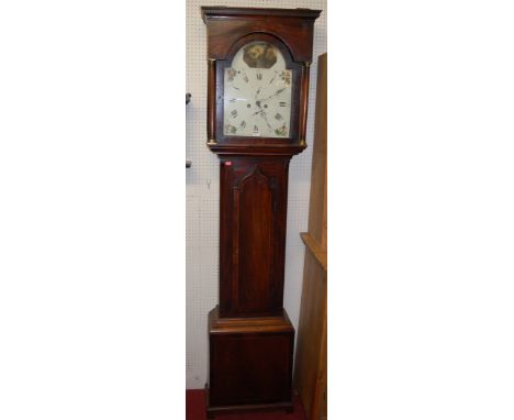 An early 19th century mahogany and satinwood strung longcase clock, having arched painted dial, with twin winding holes, lanc