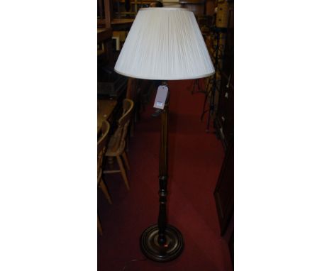 A modern beech fluted standard lamp