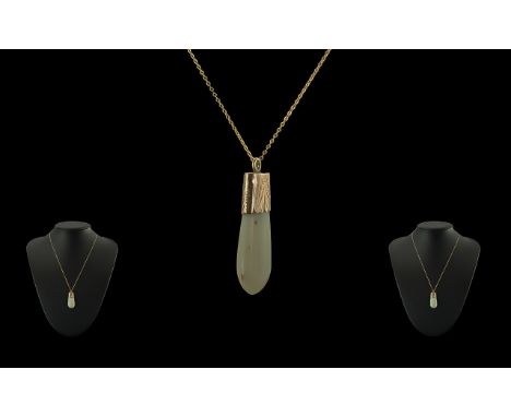 9ct Gold - Opal Set Pendant with Attached 9ct Gold Chain, Marked 9ct. The Unusual Shaped Large Opal of Green / Orange Milky C