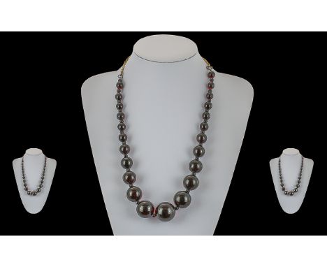 Early 20th Century Cherry Amber Graduated Beaded Necklace, Excellent Rich Red Colour Under Light. Weight 63.9 grams. Length 1