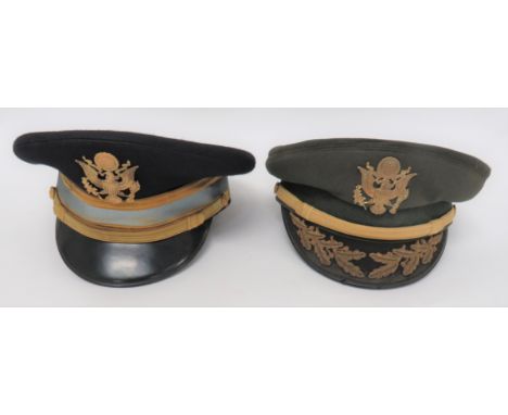 Two American Officer Caps consisting green felt example. &nbsp;Green mohair band. &nbsp;Black peak with gilt embroidery oak l
