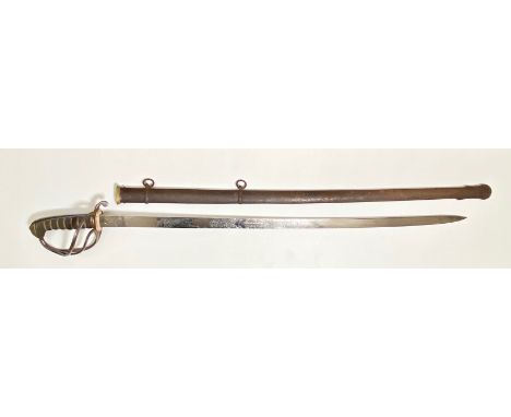 Victorian Royal Artillery Officers Sword. An unusual example having a flat unfullered 32 inch blade. This with etched decorat