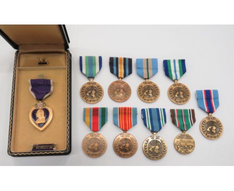 American Purple Heart gilt and enamel, unnamed, cased example. &nbsp;Together with American European campaign medal ... 8 x v