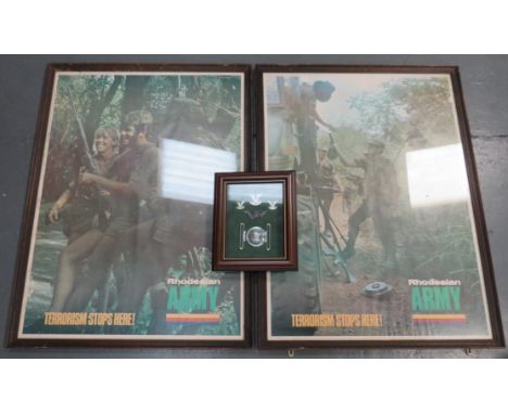 Selous Scouts Badges and Posters consisting anodised cap badges and pair of collar badges ... Darkened wing ... Chrome belt b