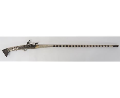 19th Century North African Snaphaunce Musket 45 1/2 inch, 50 bore barrel with swollen muzzle. &nbsp;Simple steel lock plate. 