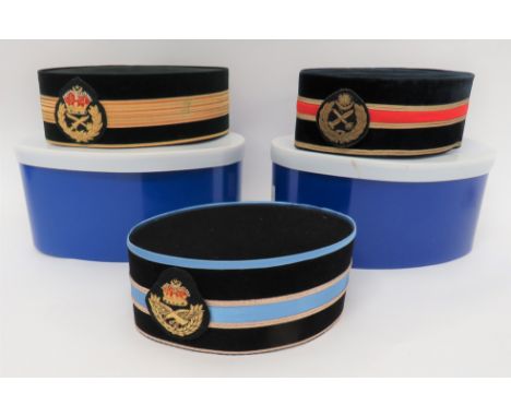 Three Malaysian High Rank Officer Caps black velvet, oval cap with central red band and gilt gimp edging. &nbsp;Bullion embro