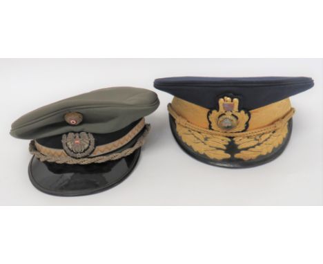 Two Eastern Officer Caps consisting Romania General's example. &nbsp;Dark blue crown and body. &nbsp;Gilt, oak leaf braid ban