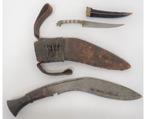 Early 20th Century Indian Knife and a Kukri 5 3/4 inch, single edged, slightly curved blade with shallow fuller. &nbsp;Brass 