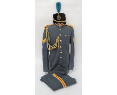 Post 1953 RAF Bandsman Uniform and Busby consisting blue grey, single breasted, high collar tunic. &nbsp;Collar with gilt bra