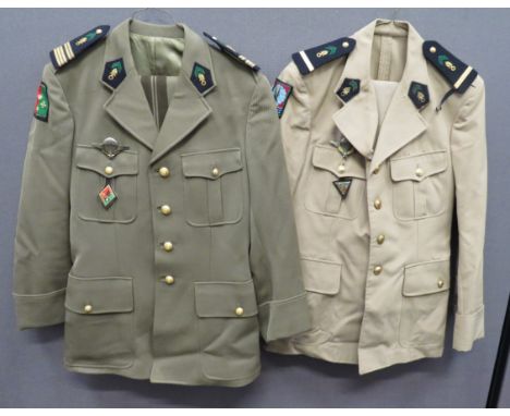 Two French Foreign Legion Officer Uniforms consisting khaki, single breasted, open collar tunic. &nbsp;Pleated chest pockets 