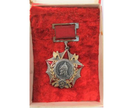 Soviet Union Order Of Alexander Nevsky Medal silvered star with overlaid gilt axes and red enamel Russian star. &nbsp;Central