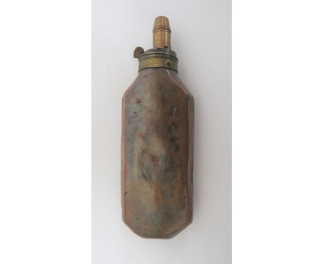 19th Century Coffin Shape Powder Flask copper, flat side, coffin shape body. &nbsp;Brass top with exposed spring. &nbsp;Adjus