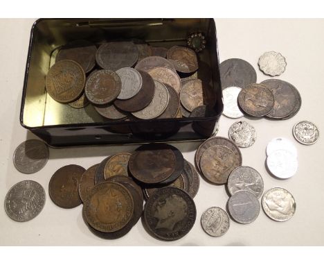 Tin of mixed UK and world coins including silver. P&amp;P Group 2 (£18+VAT for the first lot and £3+VAT for subsequent lots) 