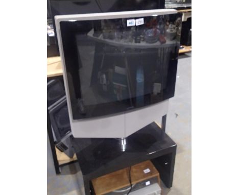 Bang & Olufsen Beovision 1 television on motorised stand, lacking remote. Not available for in-house P&P, contact Paul O'Hea 